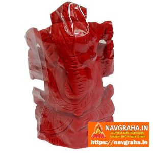 Red stone with moonga powder Ganesha