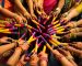 people with dandiya sticks celebrating navratri festival