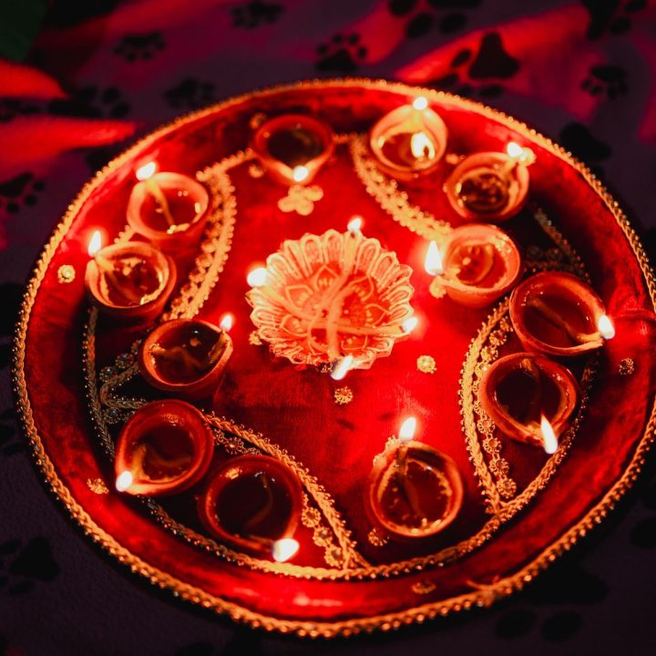 traditional decorative diwali candle with ornaments and flames