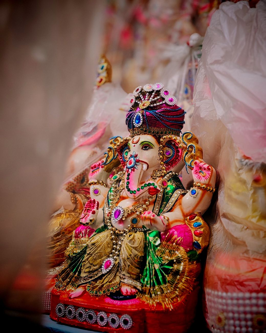 vibrant ganesha idol adorned with jewels