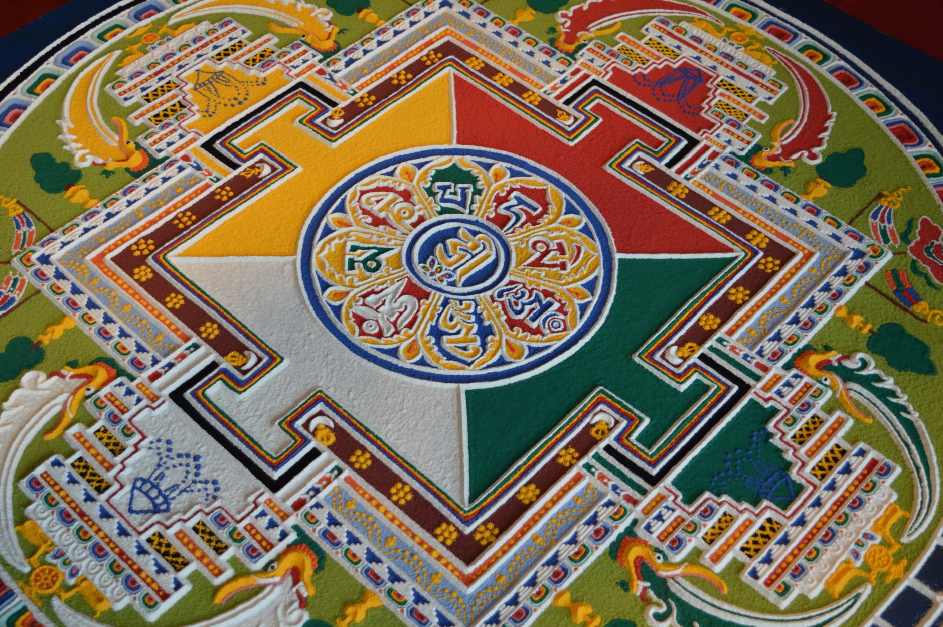 vibrant tibetan sand mandala with intricate patterns